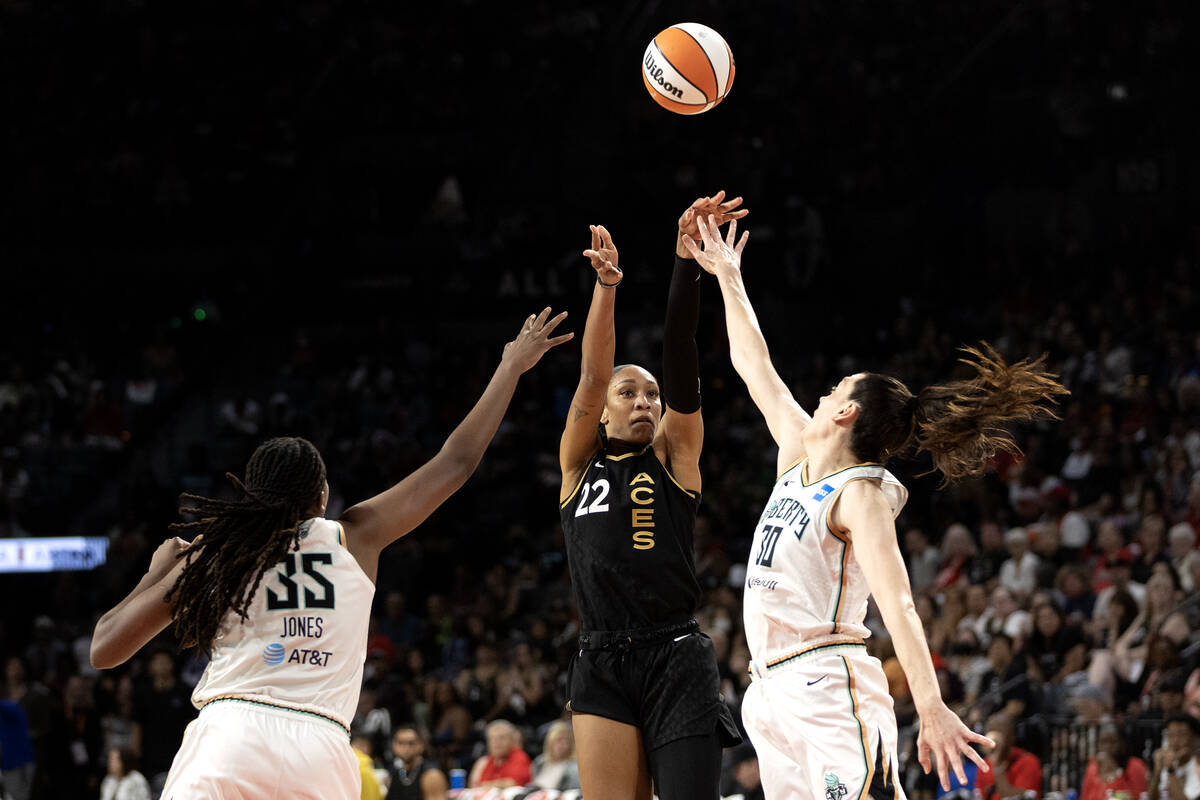 Las Vegas Aces forward A'ja Wilson (22) shoots against New York Liberty forward Jonquel Jones ( ...