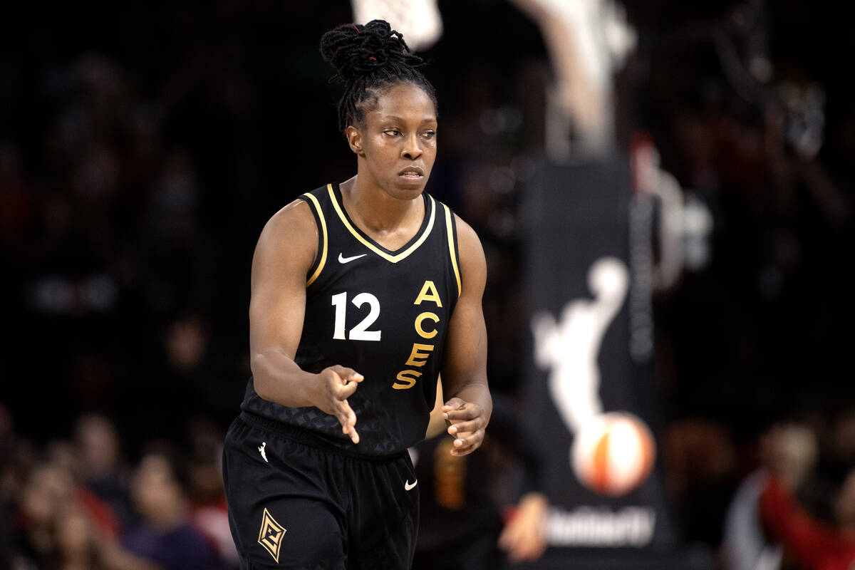 Las Vegas Aces guard Chelsea Gray (12) gestures after scoring a three-pointer during the second ...