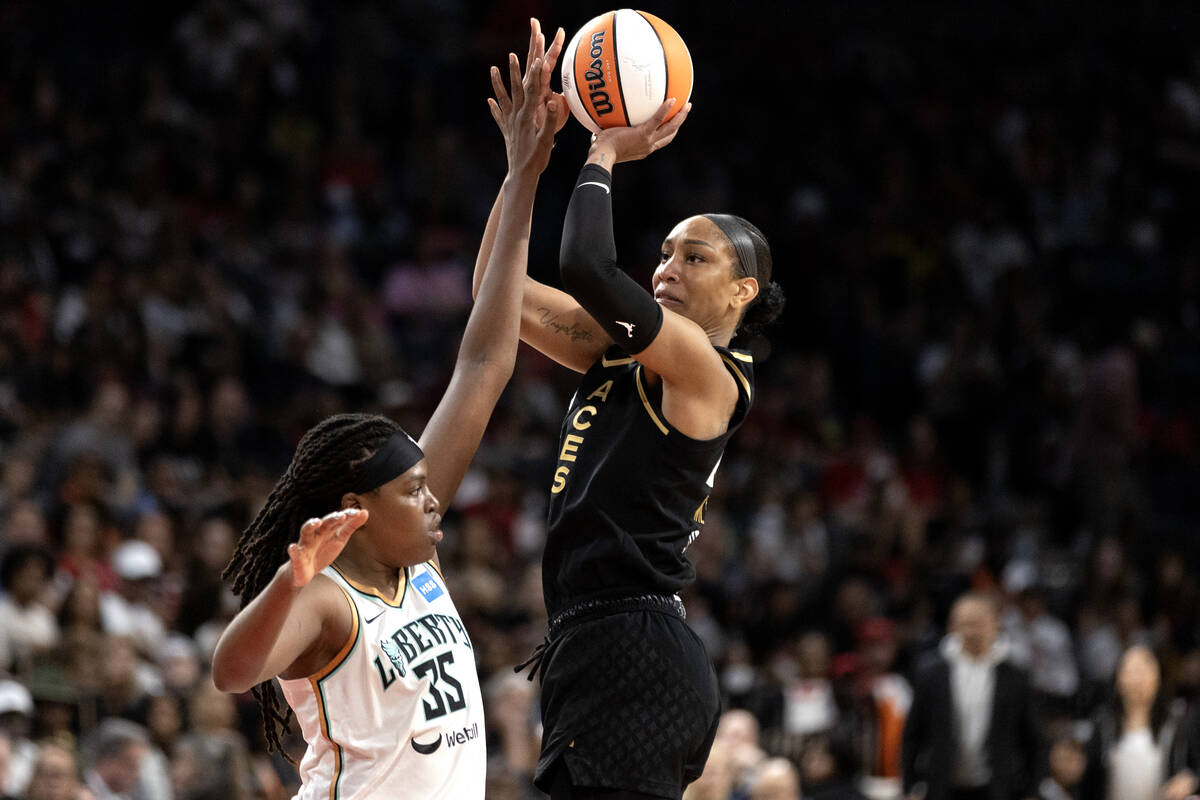 Las Vegas Aces forward A'ja Wilson (22) shoots against New York Liberty forward Jonquel Jones ( ...
