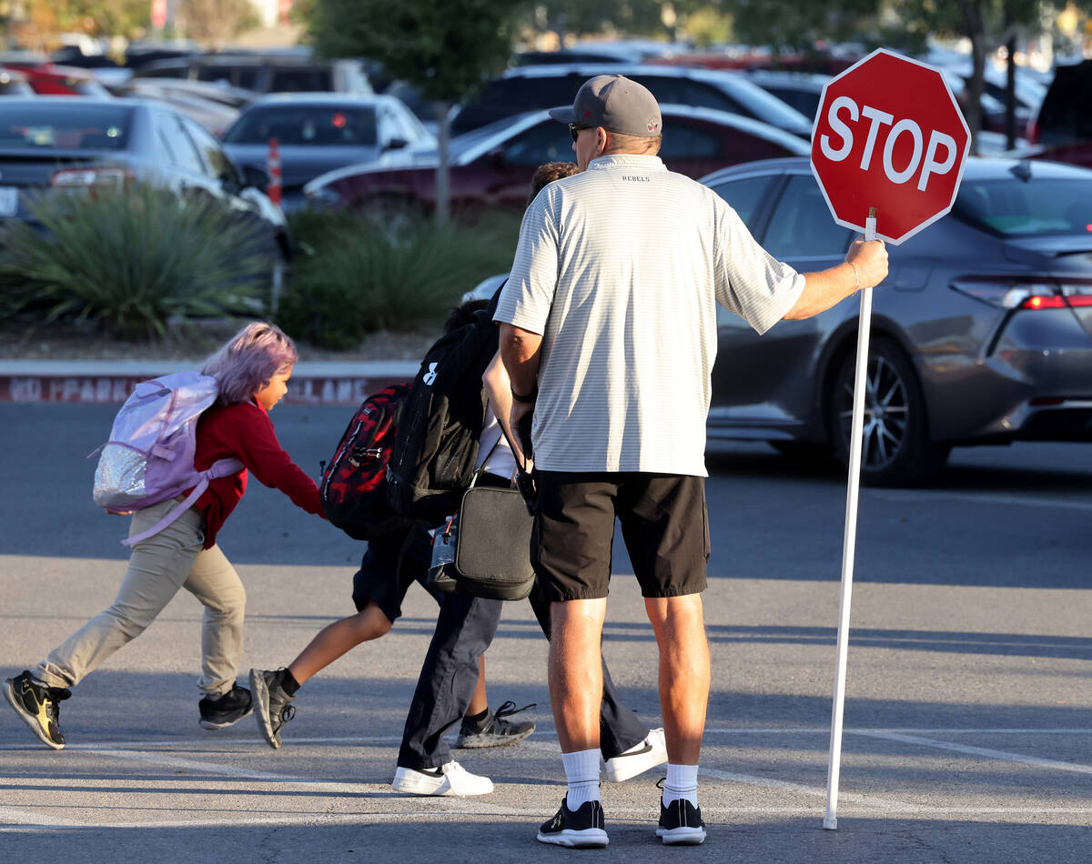 Students arrive for school at Somerset Academy’s Losee in North Las Vegas, Monday, Oct. ...