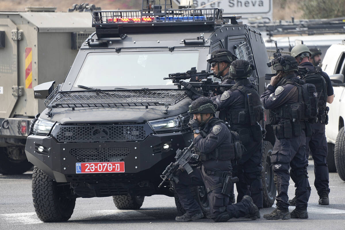 Israeli police deploy near Ashkelon, Israel, on Sunday, Oct.8, 2023. Hamas militants stormed ov ...