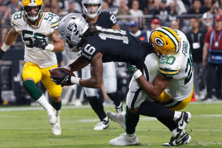 Raiders wide receiver Jakobi Meyers (16) scores a touchdown during the first half of an NFL foo ...
