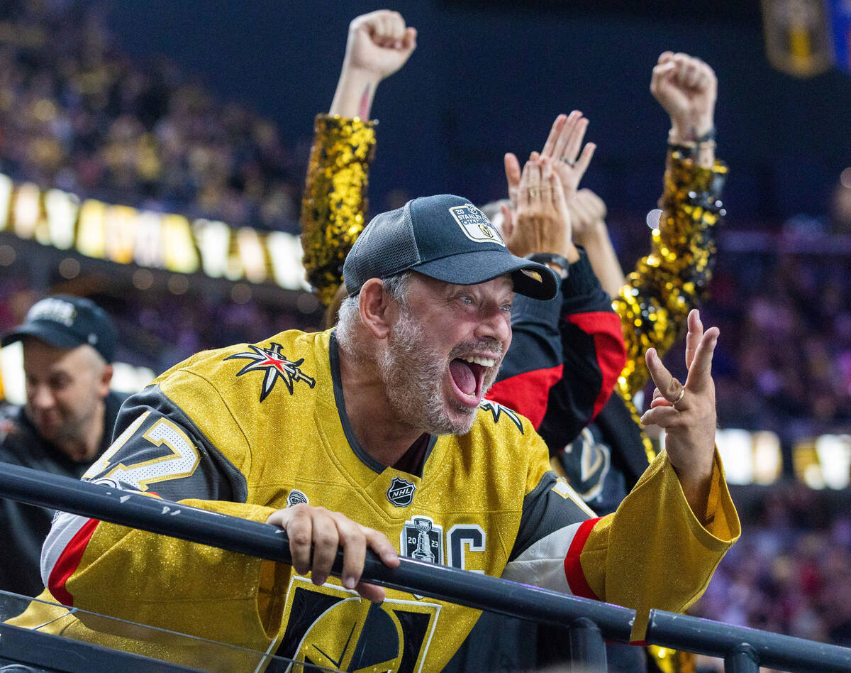 Golden Knights fans celebrate the third goal against the Seattle Kraken during the second perio ...