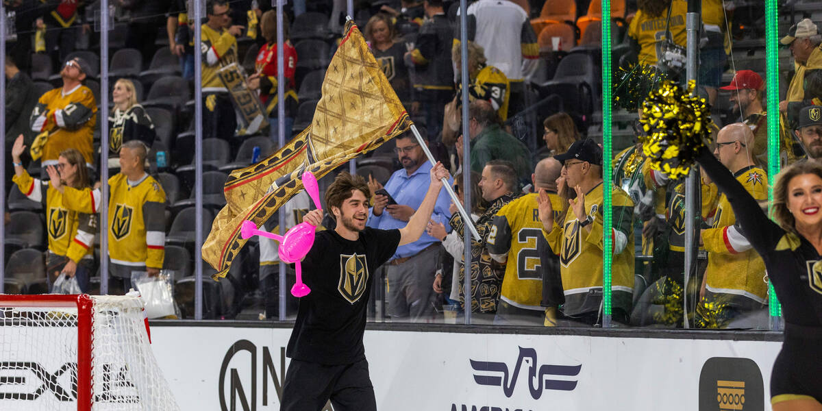 A Golden Knights ice crewman skates with a pink flamingo from the ice after their 4-1 win over ...