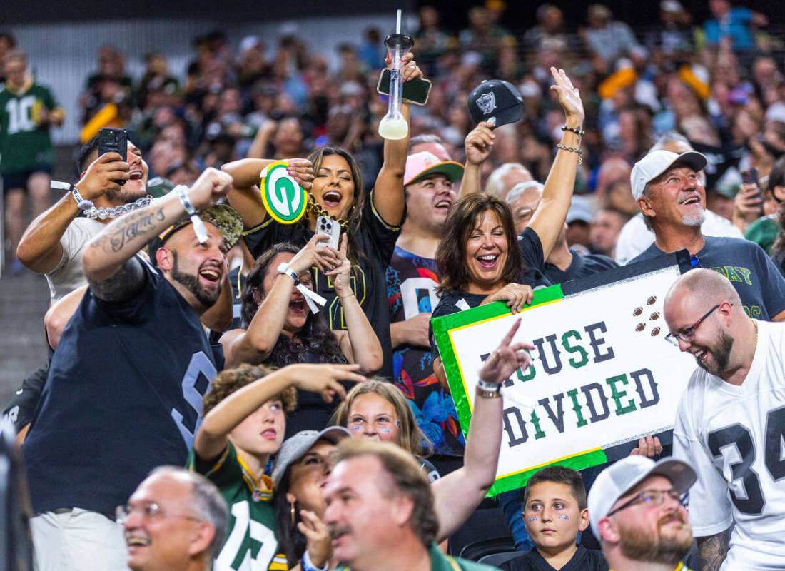 Raiders fans are pumped against the Green Bay Packers during the first half of their NFL game a ...