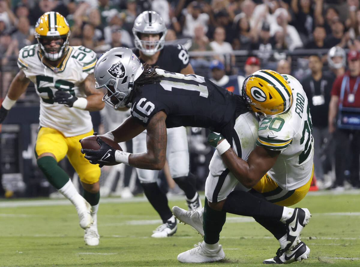 Raiders wide receiver Jakobi Meyers (16) scores a touchdown during the first half of an NFL foo ...