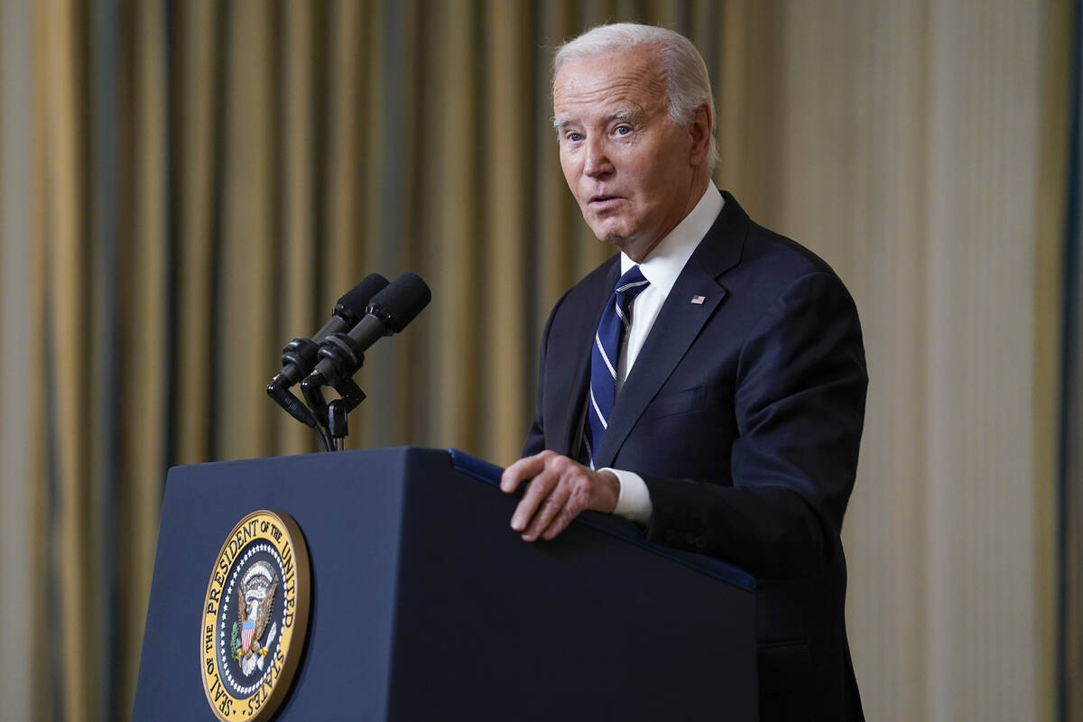 President Joe Biden speaks Tuesday, Oct. 10, 2023, in the State Dining Room of the White House ...