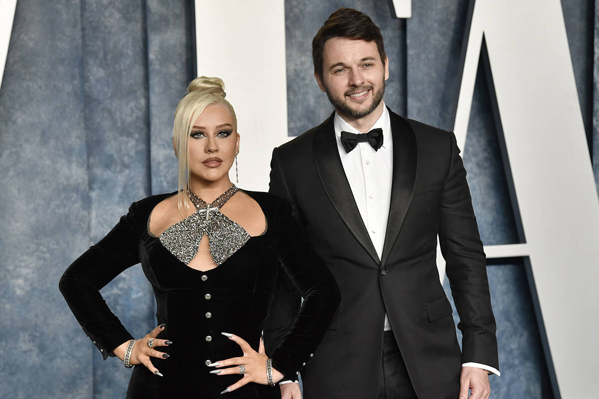 Christina Aguilera, left, and Matthew Rutler arrive at the Vanity Fair Oscar Party on Sunday, M ...
