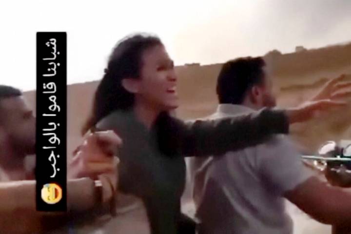 In this image from video obtained by the AP, Noa Argamani reacts as she and her partner Avinata ...