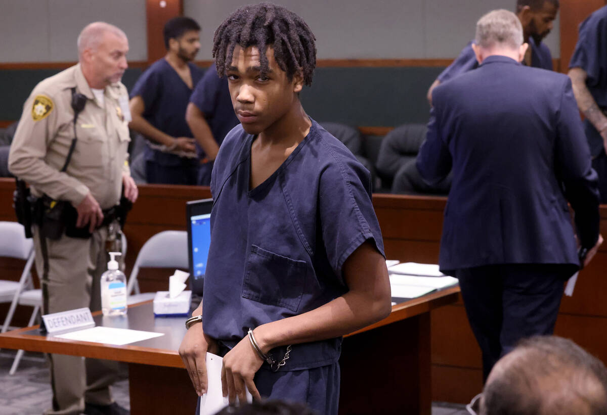 Jzamir Keys, 16, walks out of the courtroom after appearing at the Regional Justice Center in L ...