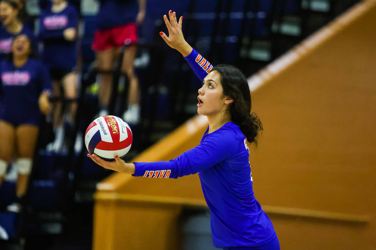 Bishop Gorman libero Tatum Thompson (8) serves the ball during a game against Shadow ridge at B ...