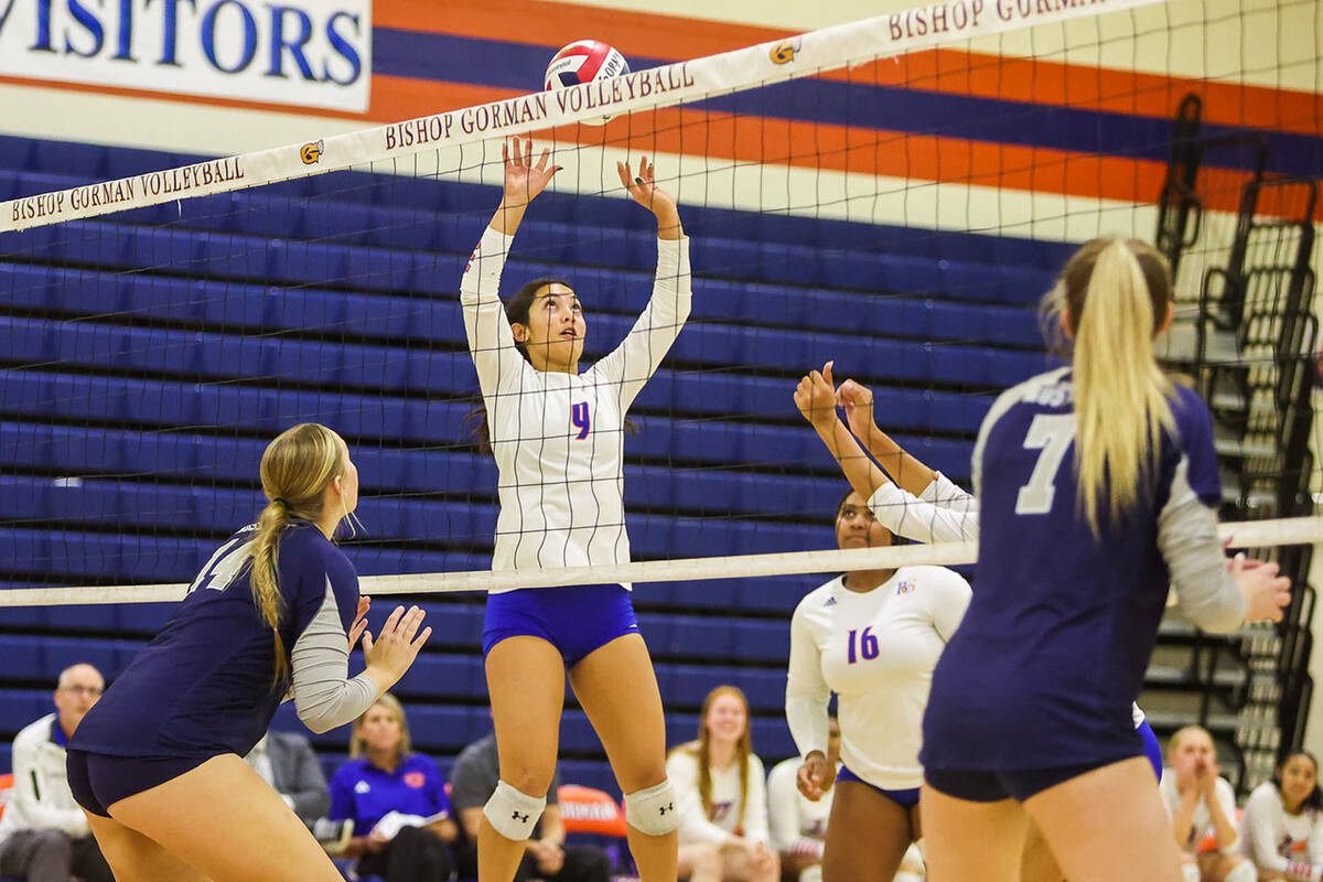 Bishop Gorman setter Trinity Thompson (9) brings the ball over the net during a game against Sh ...