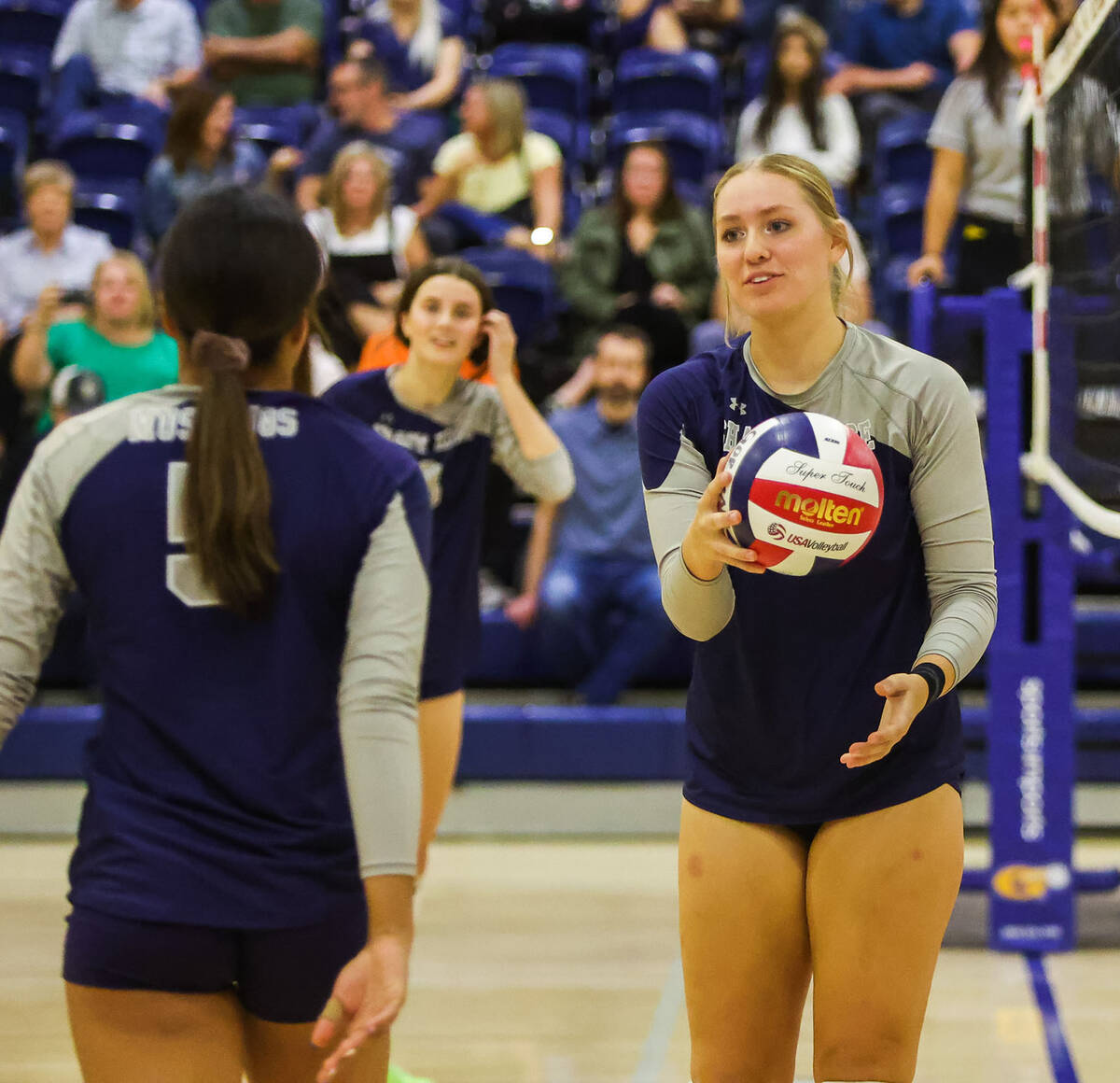 Shadow Ridge middle blocker Bree Farrimond (14) speaks to a teammate during a game against Bish ...