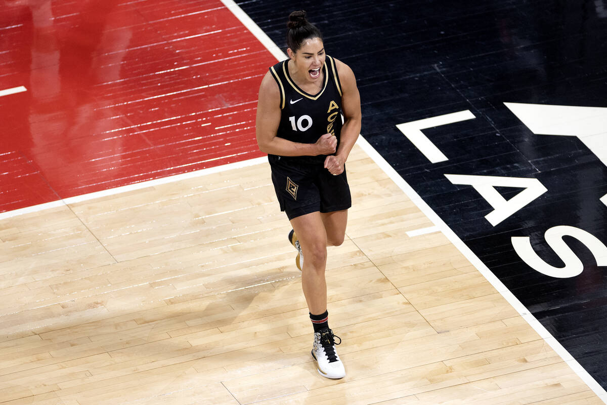 Las Vegas Aces guard Kelsey Plum (10) celebrates after scoring during the first half in Game 2 ...
