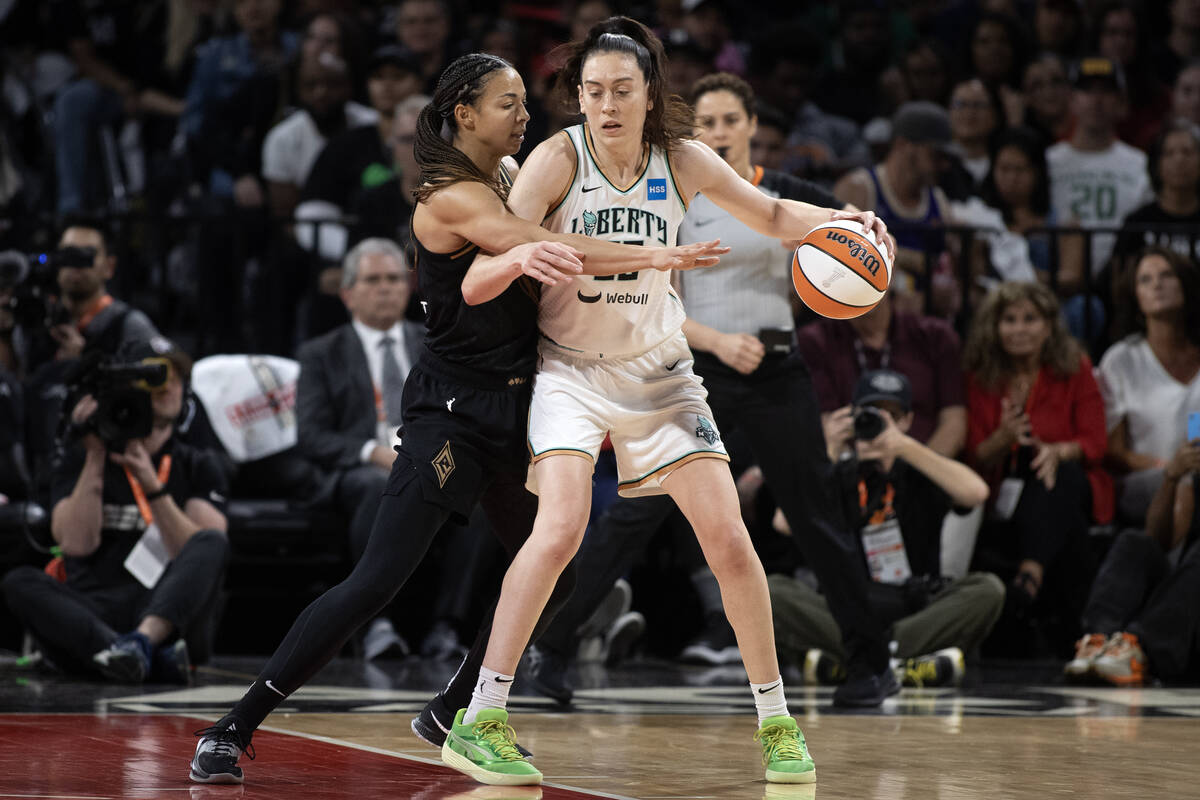 Las Vegas Aces center Kiah Stokes (41) guards New York Liberty forward Jonquel Jones (35) durin ...