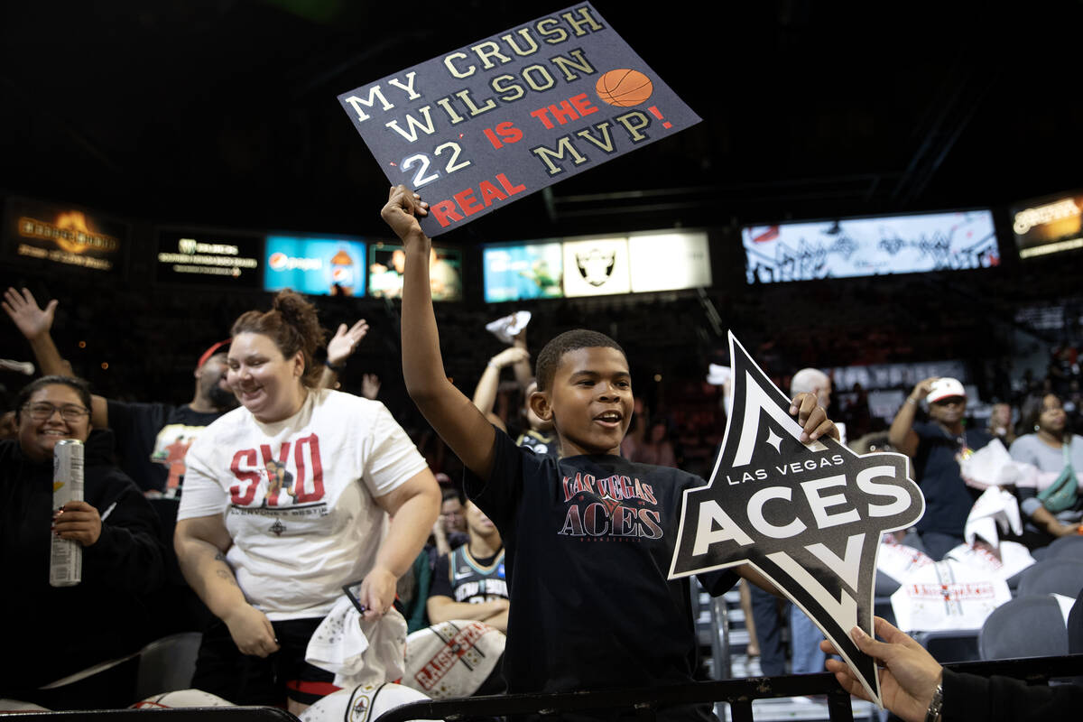 Calvin Johnson, of Hawaii, cheers for the Las Vegas Aces before Game 2 of a WNBA basketball fin ...