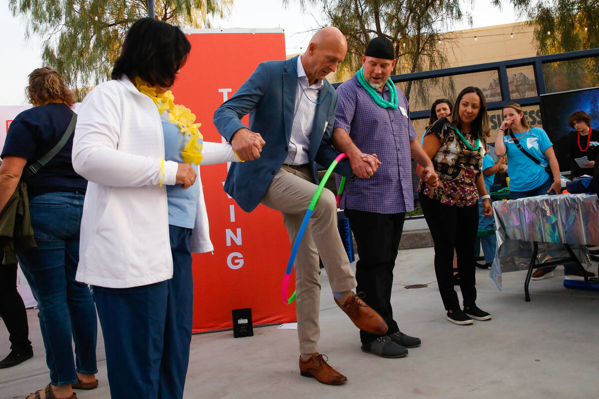 Adam Young participates in an interactive exercise that is meant to introduce student’s ...
