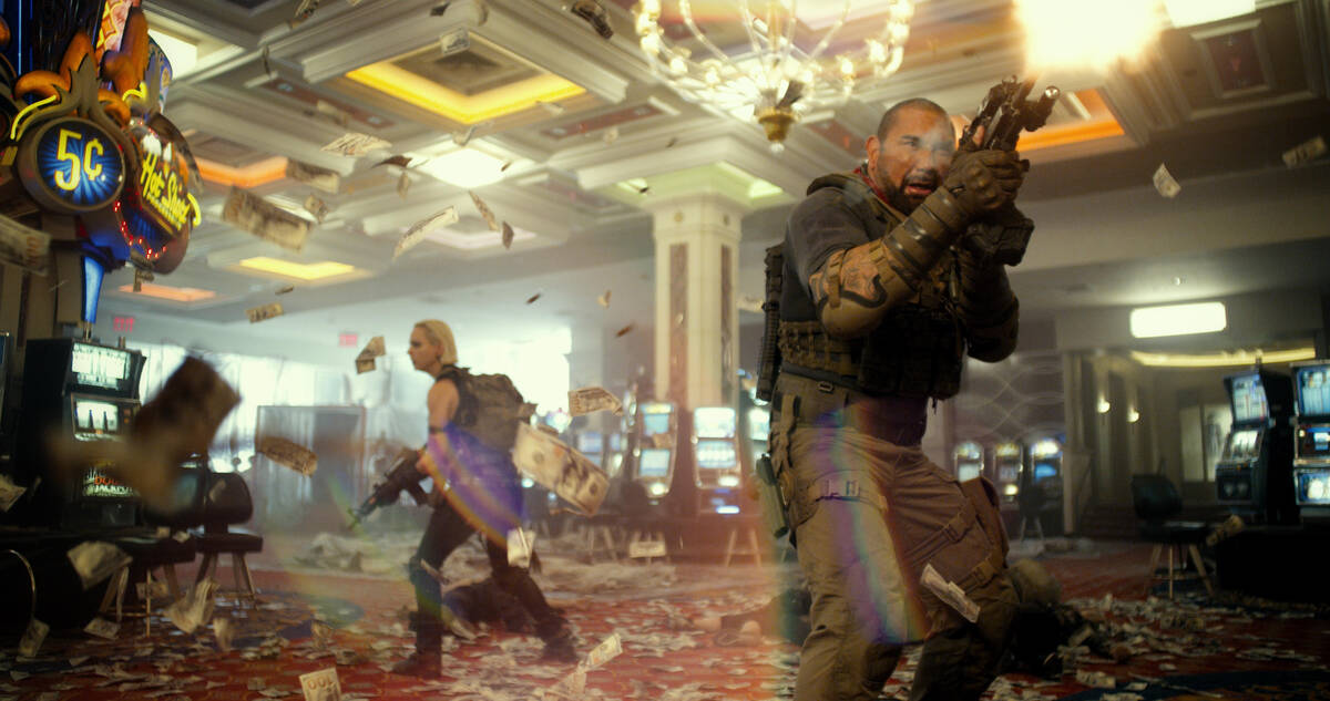 Mercenary Scott Ward (Dave Bautista) battles zombies in a Las Vegas casino in "Army of the Dead ...