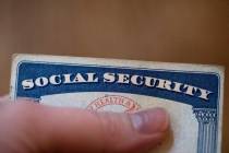FILE - A Social Security card is displayed on Oct. 12, 2021, in Tigard, Ore. About 71 million ...