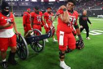 UNLV Rebels offensive lineman Leif Fautanu (79) pulls the Fremont Cannon after his team's win a ...