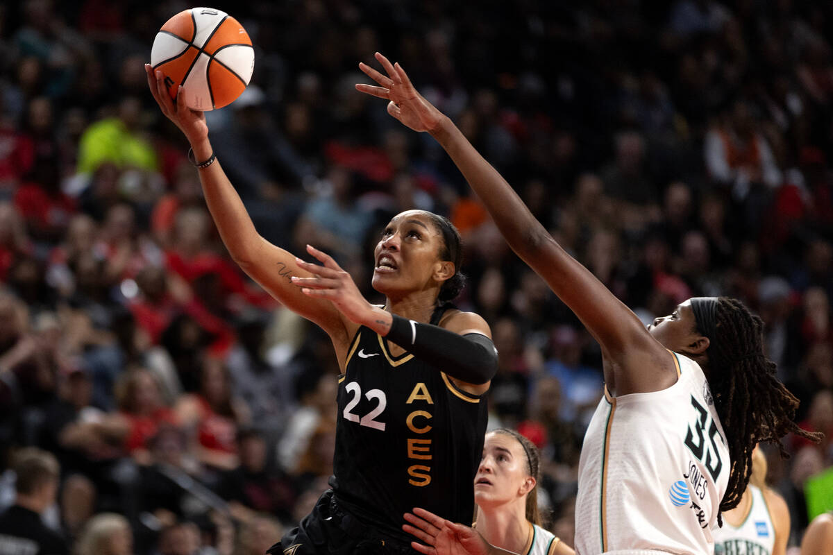 Las Vegas Aces forward A'ja Wilson (22) shoots against New York Liberty forward Jonquel Jones ( ...