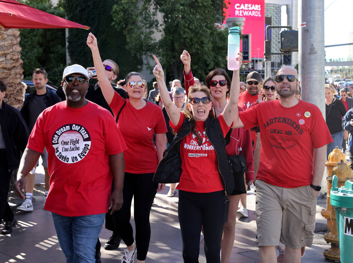 Members of Culinary Local 226, including Bellagio cocktail server Leslie Lilla, center, picket ...