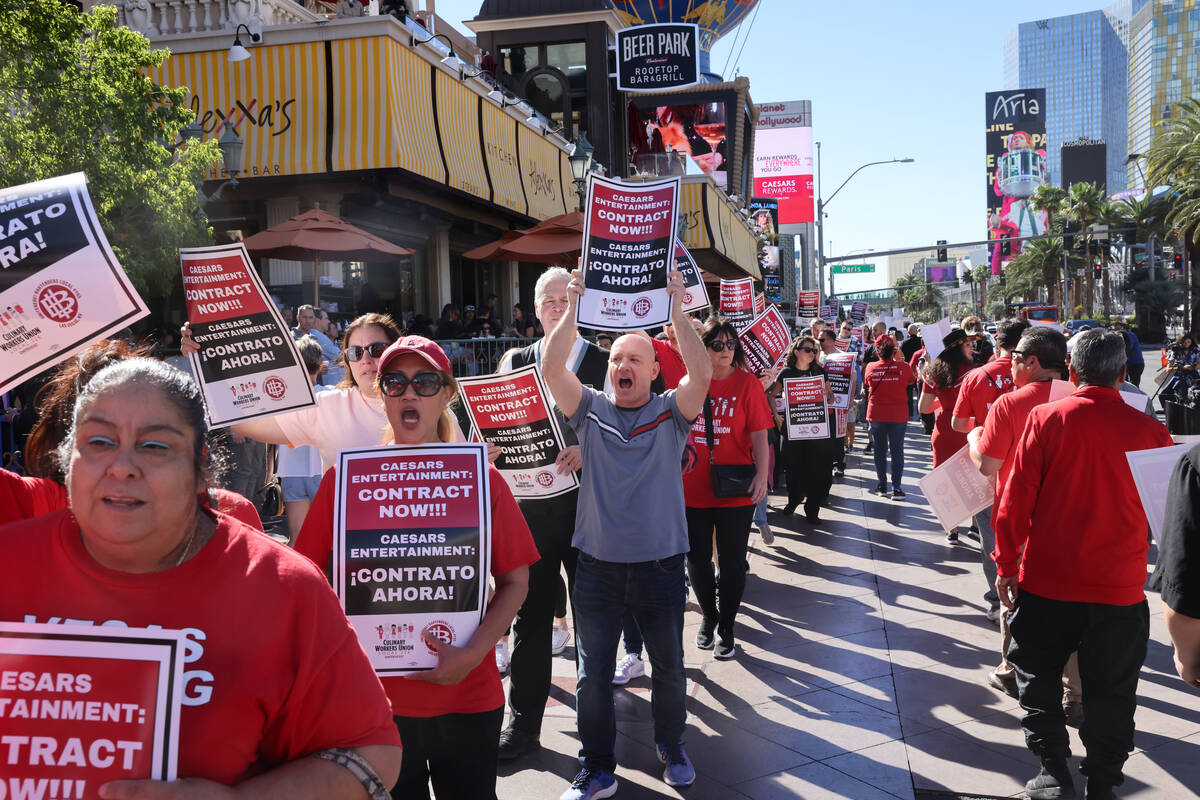 Members of Culinary Local 226 picket in front of Paris Las Vegas on the Strip Thursday, Oct. 12 ...