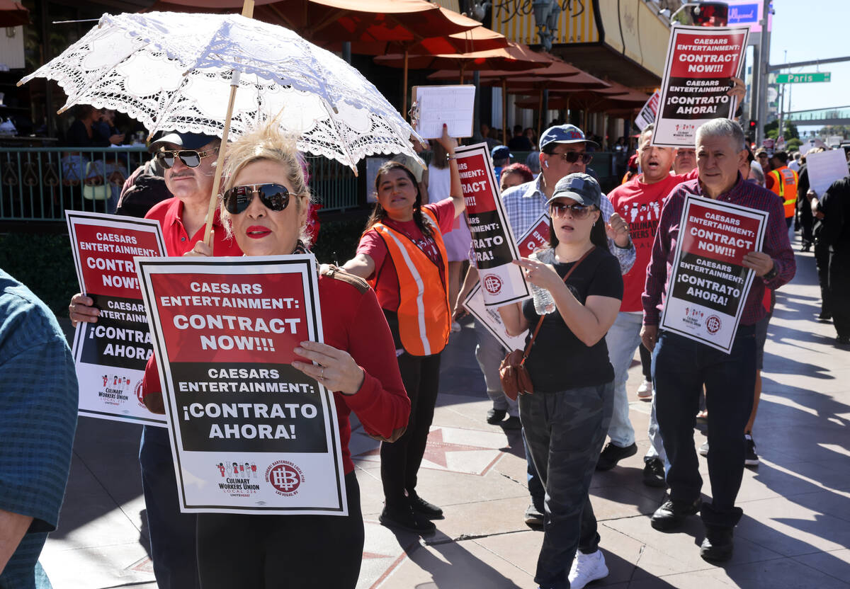 Members of Culinary Local 226, including Bellagio hostess Rocio Hernandez,, left, picket in fro ...
