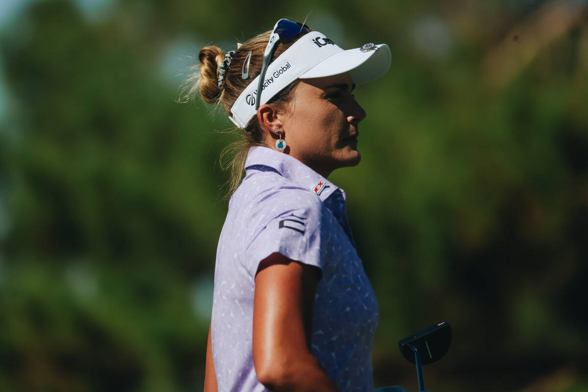 Lexi Thompson watches another player golf during the Shriners Children’s Open tournament ...