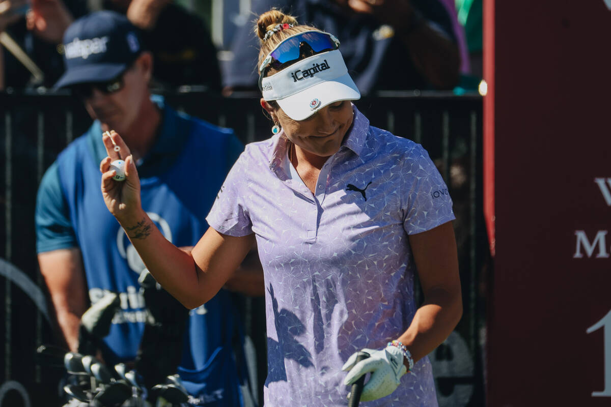 Lexi Thompson reacts to fans cheering for her before swinging on the first green during the Shr ...