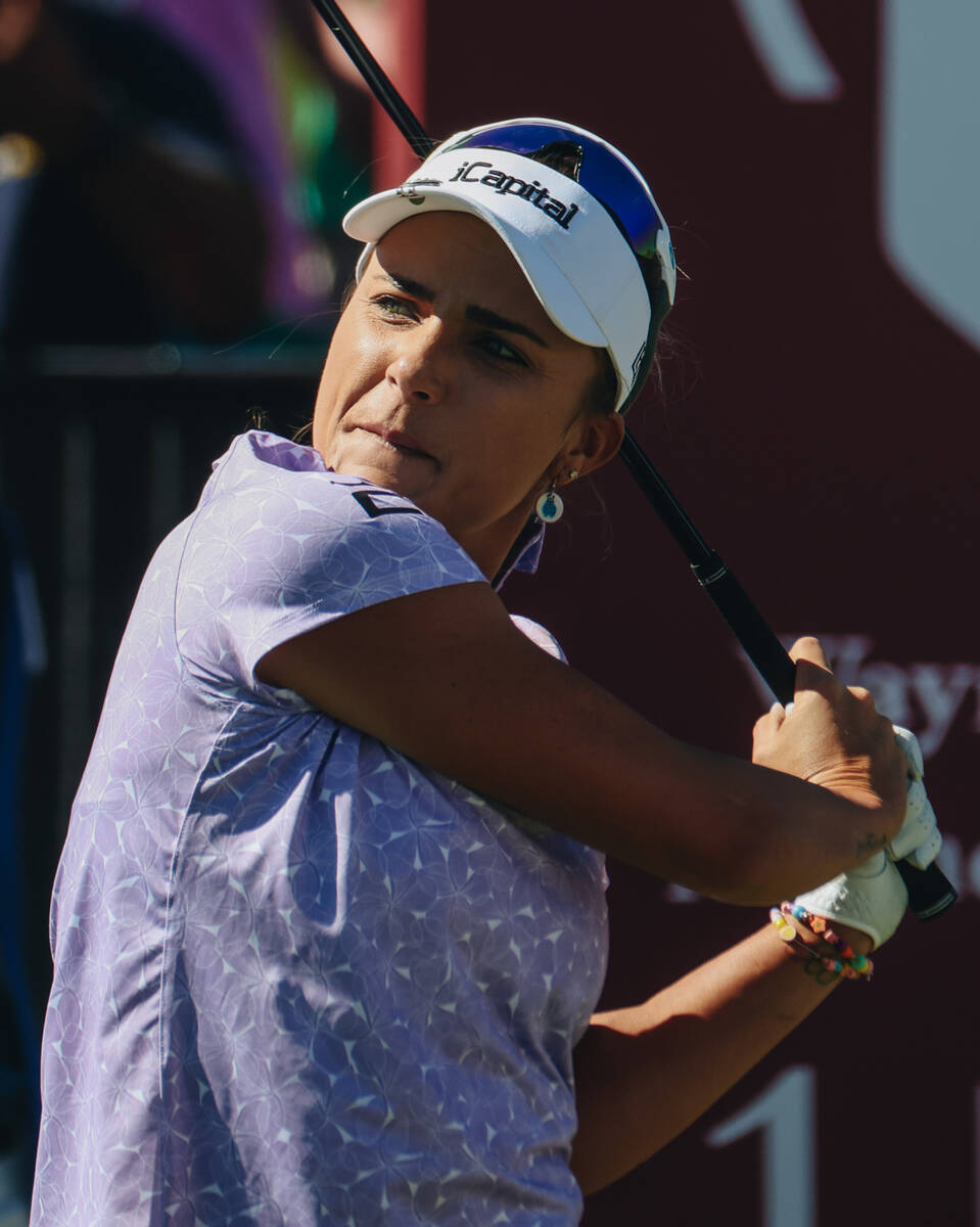 Lexi Thompson swings on the first green during the Shriners Children’s Open tournament a ...