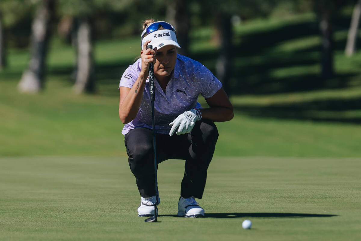 Lexi Thompson surveys her ball on the first green during the Shriners Children’s Open to ...