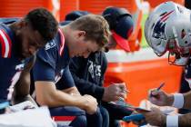 New England Patriots quarterback Mac Jones during the first half of an NFL football game, Sunda ...