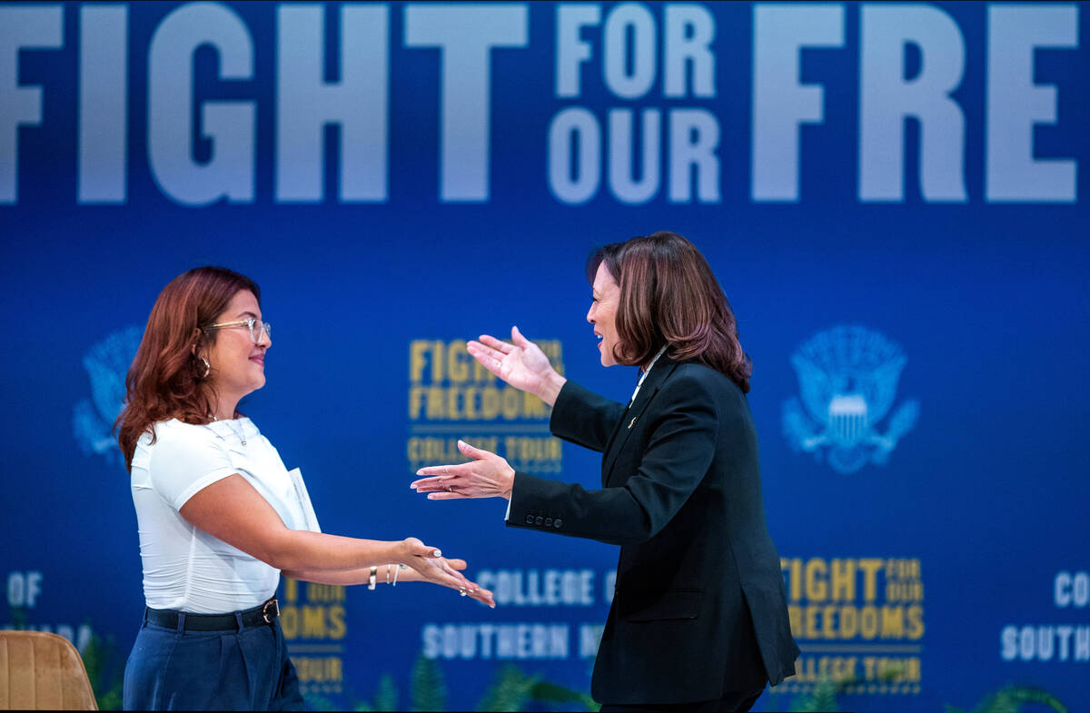 Vice President Kamala Harris, right, greets moderator Annie Gonzalez arriving on stage during h ...