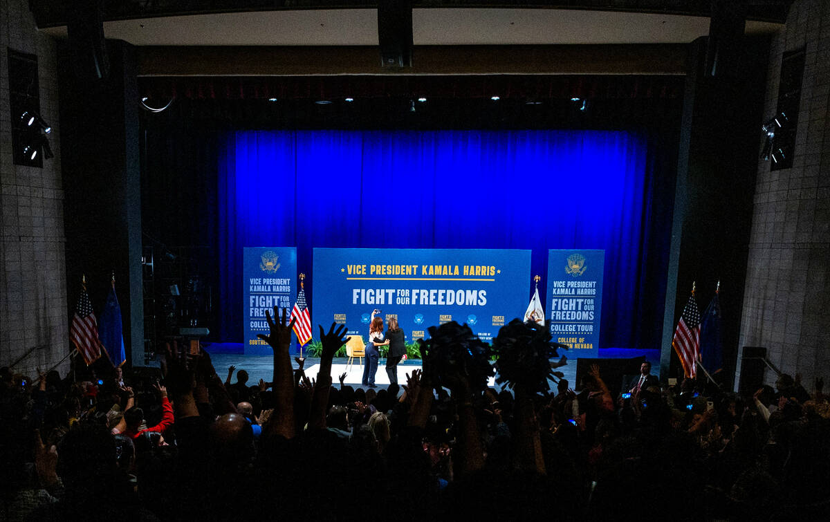 Vice President Kamala Harris, right, and moderator Annie Gonzalez takes a group selfie on stage ...