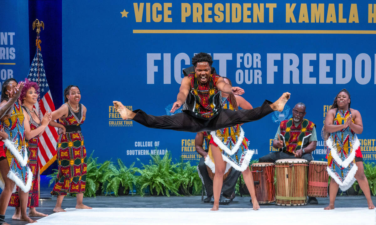A West African dance and step team performs for the crowd before Vice President Kamala Harris s ...