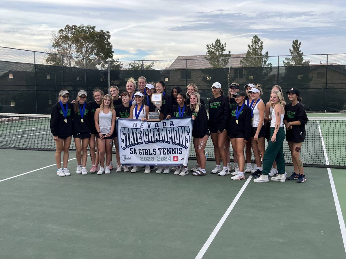The Palo Verde girls tennis teams celebrates its Class 5A state title Friday, Oct. 13, 2023, at ...