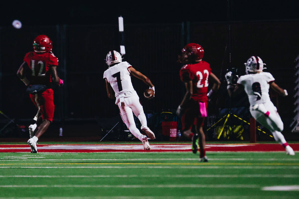 Liberty wide receiver Jayden Robertson (7) makes it into the end zone for a touchdown during a ...