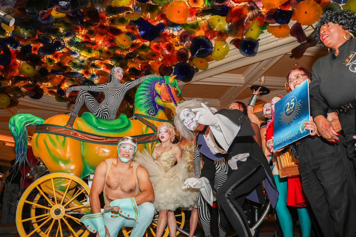Cirque du Soleil performers walk through the Bellagio as part of the “O” annivers ...