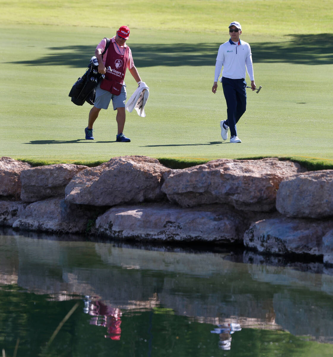 Michael Kim walks toward the 18th green during the Shriners Children’s Open tournament a ...