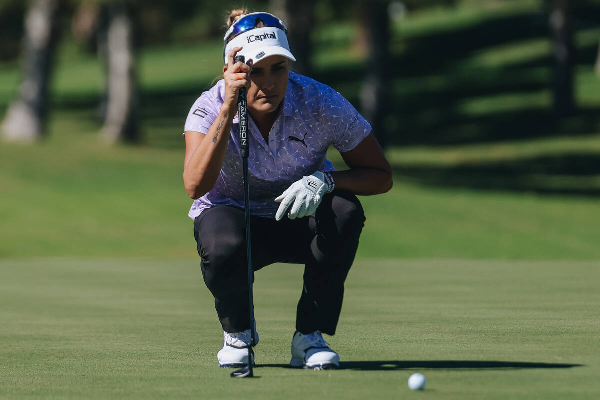 Lexi Thompson surveys her ball on the first green during the Shriners Children’s Open to ...