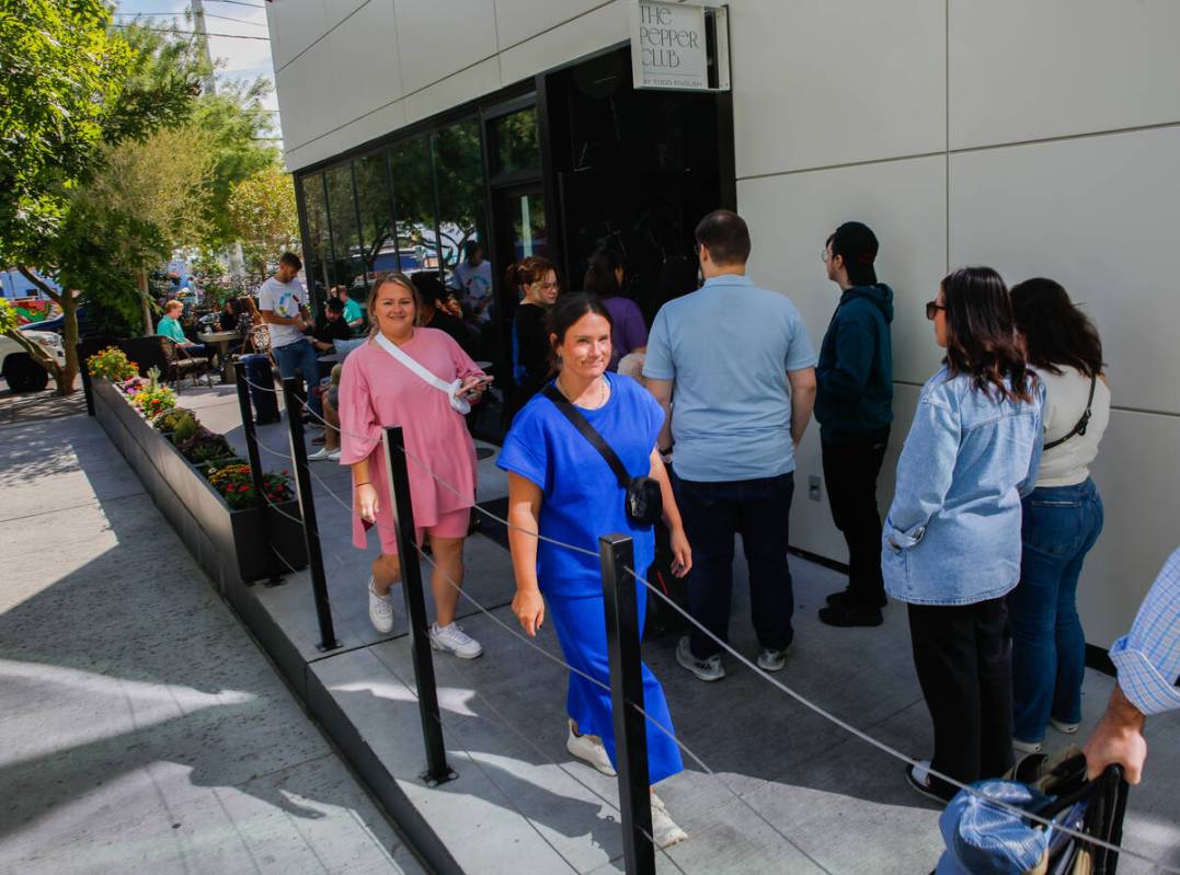 Customers arrive to The Pepper Club, which is part of the Midtown development, on Friday, Oct. ...