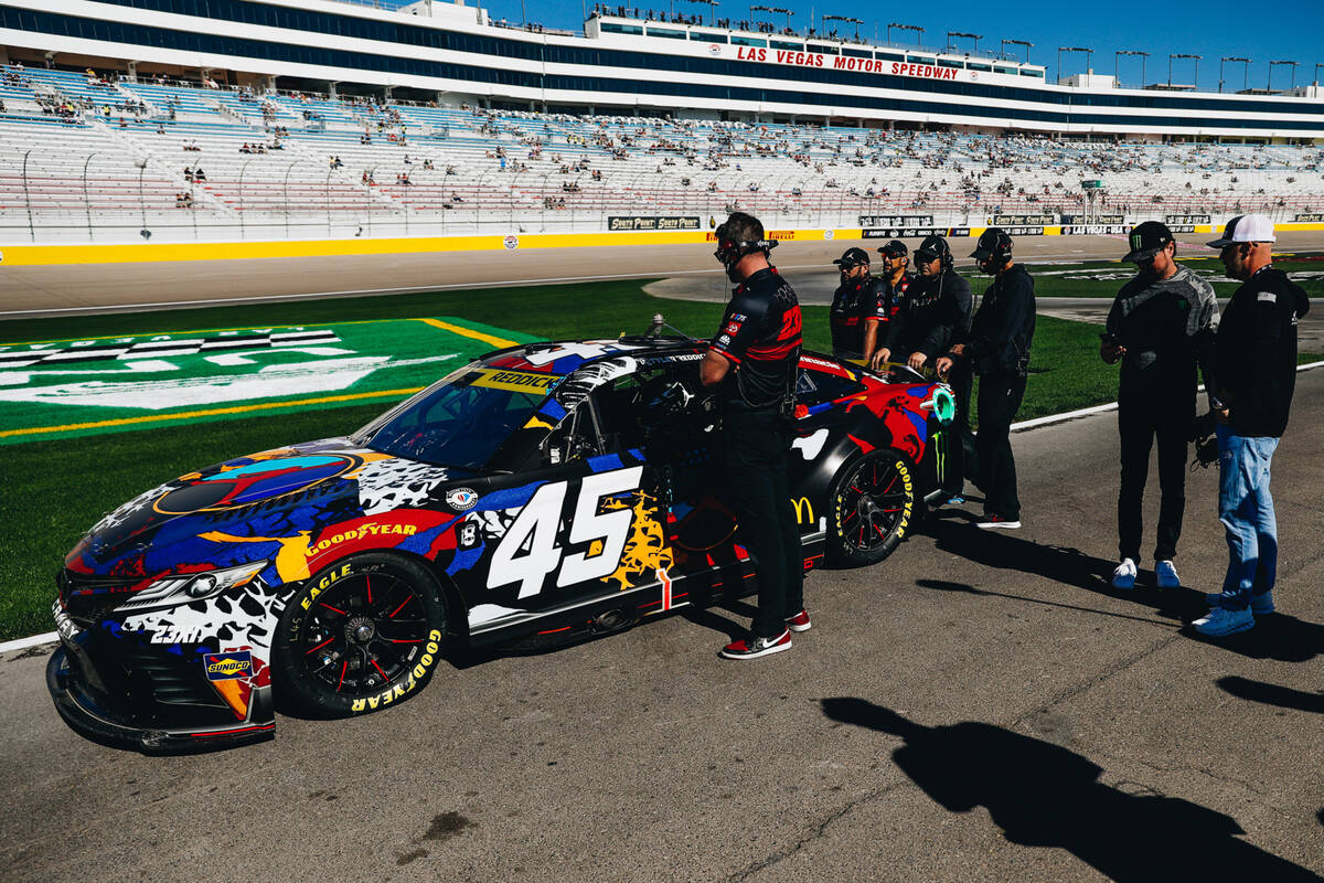 Tyler Reddick gets ready to ride his race car during practice for the NASCAR South point 400 at ...