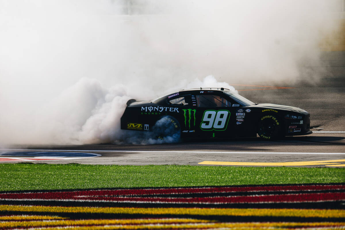 Riley Herbst celebrates winning first place in the NASCAR Xfinity Series race at the Las Vegas ...