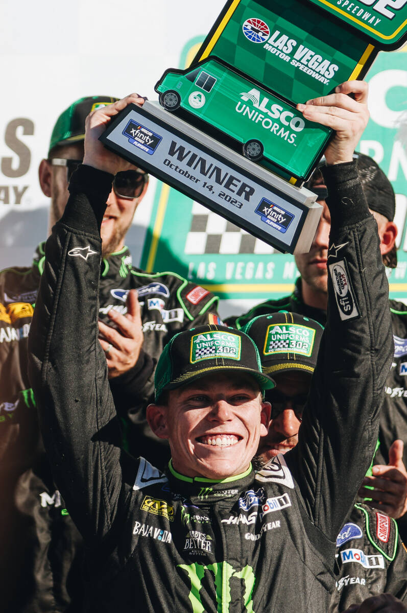 Riley Herbst celebrates winning first place in the NASCAR Xfinity Series race at the Las Vegas ...