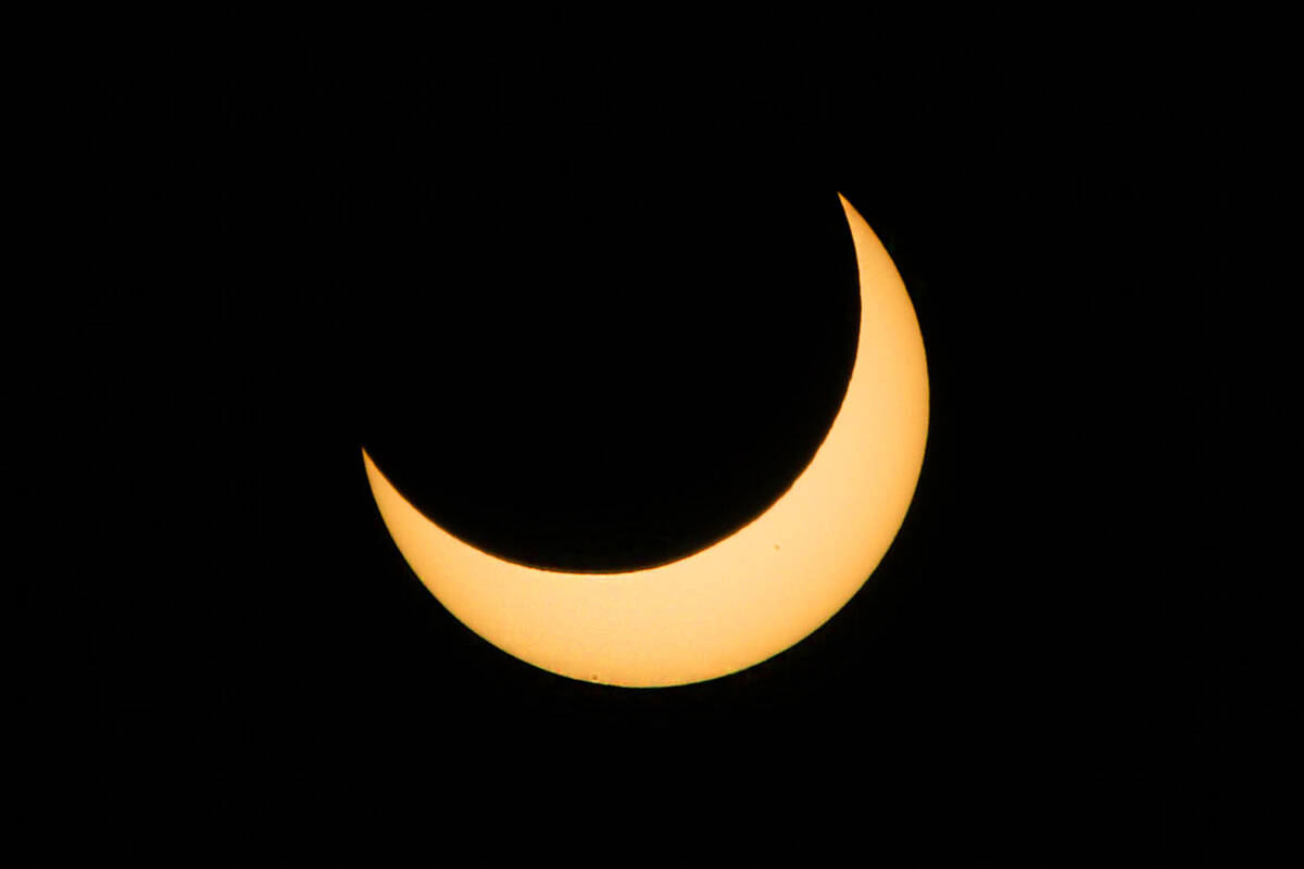 The Moon passes between Earth and the Sun partly obscuring the image of the Sun during an annul ...