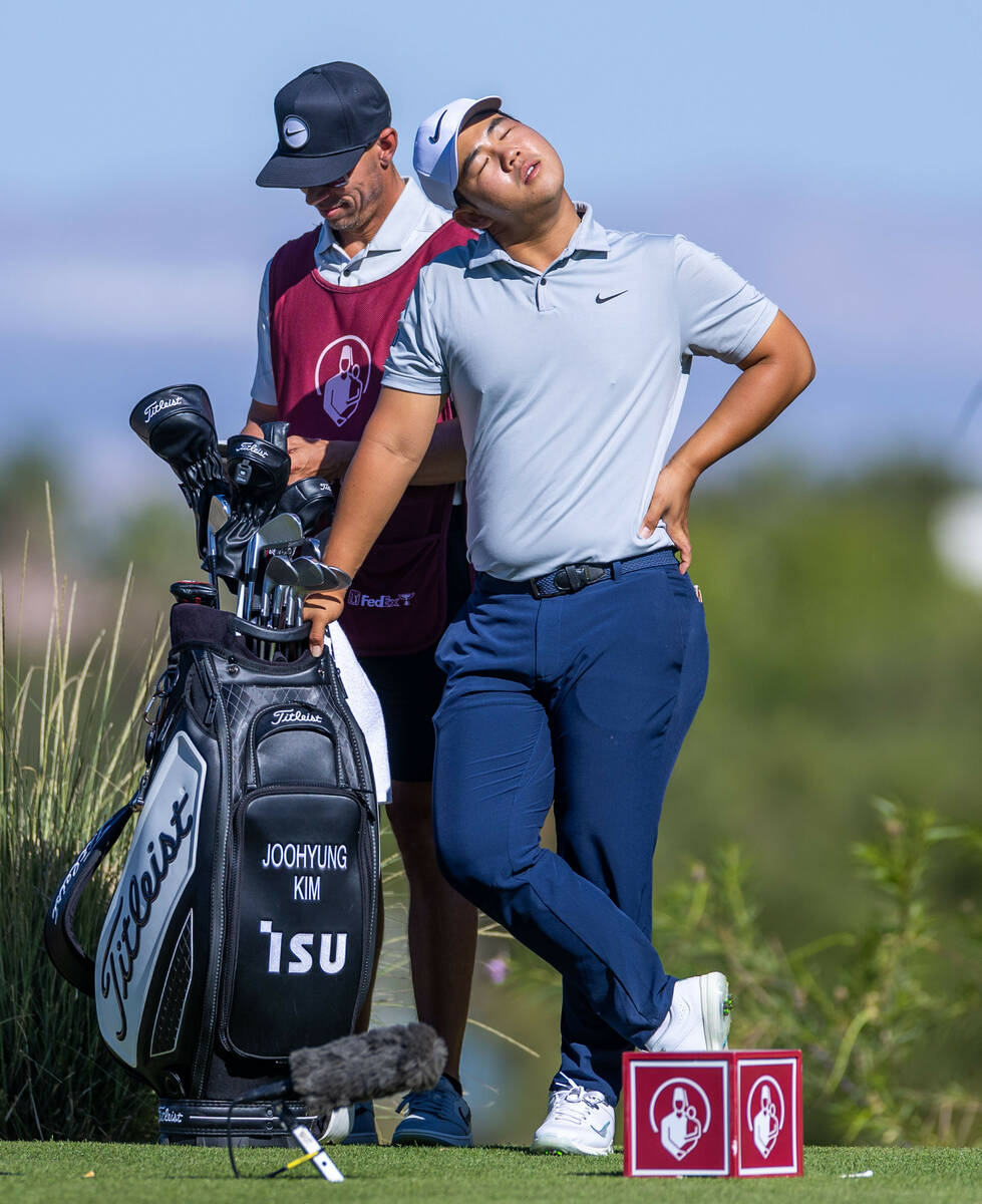 Tom Kim stays loose on the tee at hole 18 during day 3 play at the Shriners Children's Open fro ...