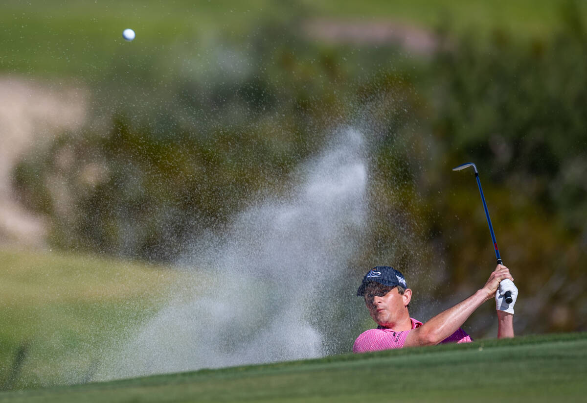 Henrik Norlander wedges out of the sand onto the green at hole 3 during day 3 play at the Shrin ...