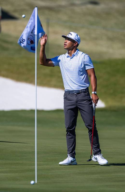 Isaiah Salinda catches a ball from his caddie on hole 16 during day 3 play at the Shriners Chil ...