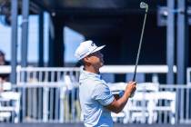 Isaiah Salinda watches his drive from the tee on hole 17 during day 3 play at the Shriners Chil ...